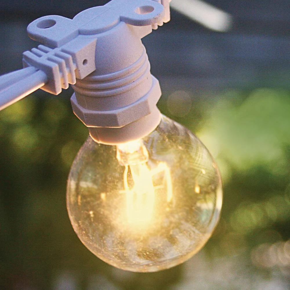 BLOWOUT 50 Socket Outdoor Commercial String Light Set, Clear Globe Bulbs, 54 FT White Cord W/ E12 C7 Base, Weatherproof 6 BLOWOUT 50 Socket Outdoor Commercial String Light Set, Clear Globe Bulbs, 54 FT White Cord W/ E12 C7 Base, Weatherproof - Image 4