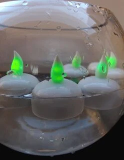 BLOWOUT Floating Waterproof Flameless LED Tea Light Candle - Green (6 PACK) -Lights Decor Shop floating led candle light green image 2 c29498fb cdab 4e95 8fc0 96be13d831aa